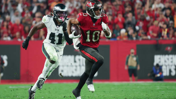 Jan 15, 2024; Tampa, Florida, USA; Tampa Bay Buccaneers wide receiver Trey Palmer (10) runs after a reception against the Philadelphia Eagles during the second half of a 2024 NFC wild card game at Raymond James Stadium. Mandatory Credit: Kim Klement Neitzel-USA TODAY Sports  