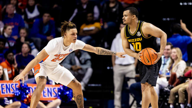 Jan 14, 2023; Gainesville, Florida, USA; Florida Gators guard Riley Kugel (24) defends Missouri Tigers guard Nick Honor (10) during the second half at Exactech Arena at the Stephen C. O'Connell Center. Mandatory Credit: Matt Pendleton-USA TODAY Sports