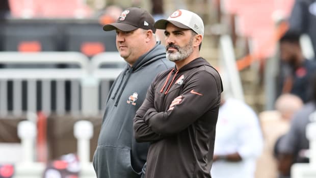 Sep 24, 2023; Cleveland, Ohio, USA; Cleveland Browns head coach Kevin Stefanski, right, and offensive coordinator Alex Van Pelt watch warm ups before the game between the Browns and the Tennessee Titans at Cleveland Browns Stadium.
