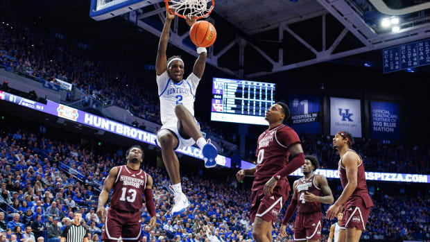 Jan 17, 2024; Lexington, Kentucky, USA; Kentucky Wildcats forward Aaron Bradshaw (2) dunks the ball during the second half against the Mississippi State Bulldogs at Rupp Arena at Central Bank Center. Mandatory Credit: Jordan Prather-USA TODAY Sports