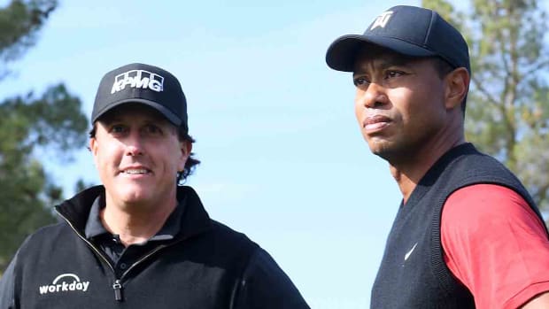 Tiger Woods and Phil Mickelson are pictured during The Match at Shadow Creek Golf Course in 2018.