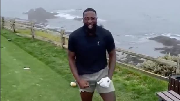 Screenshot of former NBA player Dwyane Wade celebrating a hole-in-one at Pebble Beach.