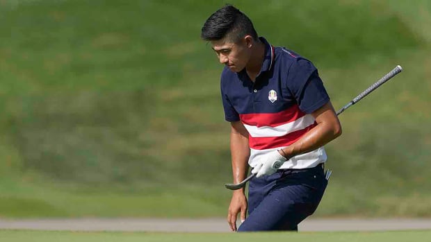 Collin Morikawa looks down as he walks on the 15th green during his singles match at the 2023 Ryder Cup in Italy.