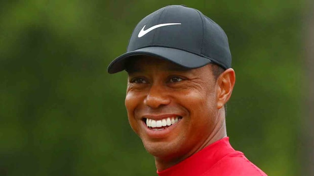 Tiger Woods smiles during the final round of the 2019 Masters.