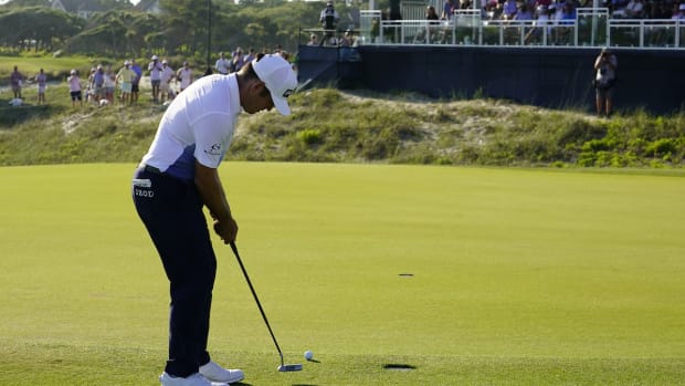 Louis Oosthuizen putts for eagle at the 16th green during the PGA Championship's final round at Kiawah Island Resort's Ocean Course on May 23, 2021.