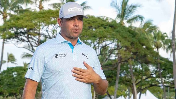 Gary Woodland reacts while walking off the 18th hole during the second round of the 2024 Sony Open in Hawaii at Waialae Country Club.