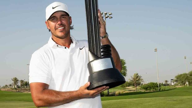 Brooks Koepka poses with the trophy after winning the 2023 LIV Golf Jeddah event.