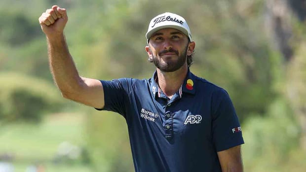 Max Homa celebrates victory after holing the winning putt on the 18th green during Day Four of the Nedbank Golf Challenge at Gary Player CC on Nov. 12, 2023 in Sun City, South Africa.