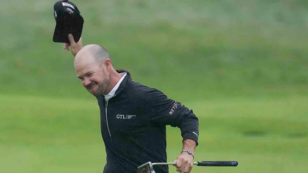 Brian Harman celebrates on the 18th green after winning the 2023 British Open at Royal Liverpool Golf Club.