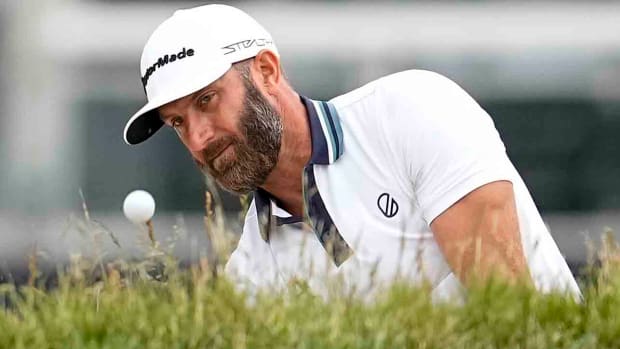 Dustin Johnson watches a shot in the first round of the 2023 U.S. Open.