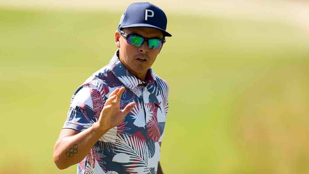 Rickie Fowler waves after his putt on the 8th hole during the second round of the 2023 U.S. Open.