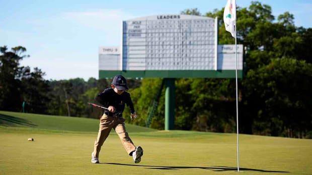 A 9-year-old golfer walks the green before putting at the Drive Chip and Putt National Finals at Augusta National Golf Club, Sunday, April 2, 2023, in Augusta, Ga.