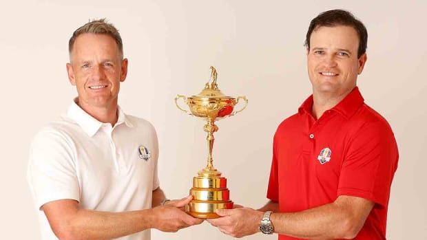 Team Captains Luke Donald of England and Zach Johnson of The United States pose for a photograph with the Ryder Cup Trophy during the Ryder Cup 2023 Year to Go Media Event on Oct. 4, 2022 in Rome, Italy.