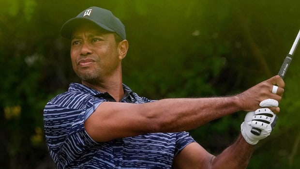 Tiger Woods watches a shot in the first round of the 2022 PGA Championship.
