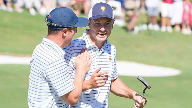 Justin Thomas and Jordan Spieth celebrate during the second day of the 2022 Presidents Cup.