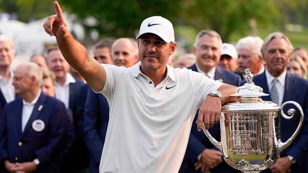 Brooks Koepka is pictured with the PGA Championship trophy after winning on May 21, 2023, at Oak Hill Country Club in Rochester, N.Y.