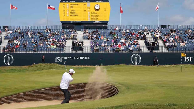 Stewart Cink plays out of a bunker on the 18th green on the first day of the 2023 British Open at Royal Liverpool Golf Club in Hoylake, England.
