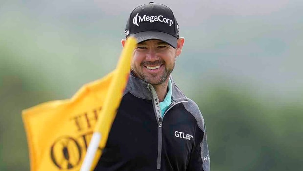 Brian Harman smiles after he chips onto the 5th green during the second day of the 2023 British Open.