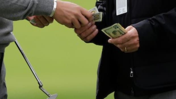 Money changes hands on golf course