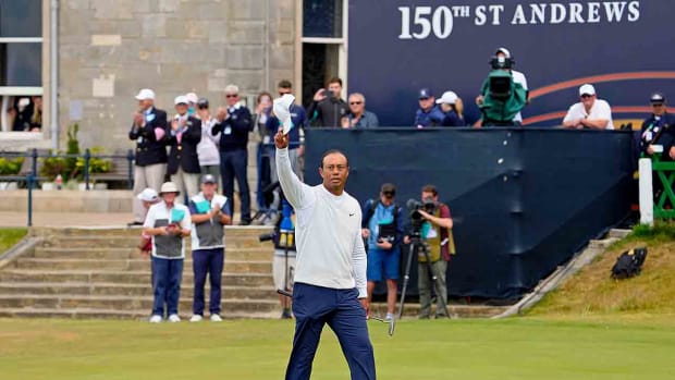 Tiger Woods waves to the fans at the 2022 British Open at St. Andrews.