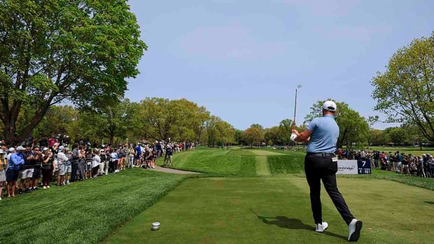 Jon Rahm tees off in a practice round at the 2023 PGA Championship.