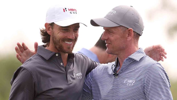 Tommy Fleetwood, Captain of Great Britain & Ireland and Luke Donald, European Ryder Cup Captain react on Day Three of the Hero Cup at Abu Dhabi Golf Club on January 15, 2023 in Abu Dhabi, United Arab Emirates.