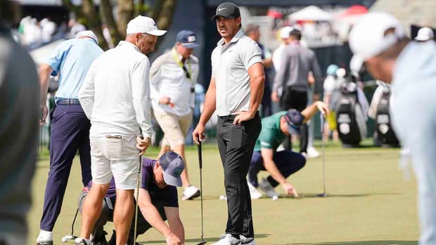 Brooks Koepka is pictured on the putting green prior to the start of the 2023 PGA Championship