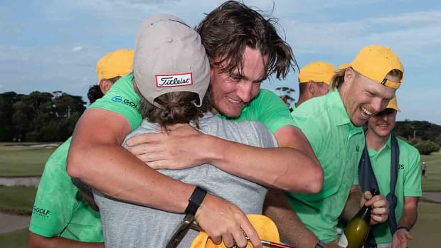 Jasper Stubbs of Australia celebrates with his Australia teammates after winning the 2023 Asia-Pacific Amateur Championship at the Royal Melbourne Golf Club in Melbourne, Australia.