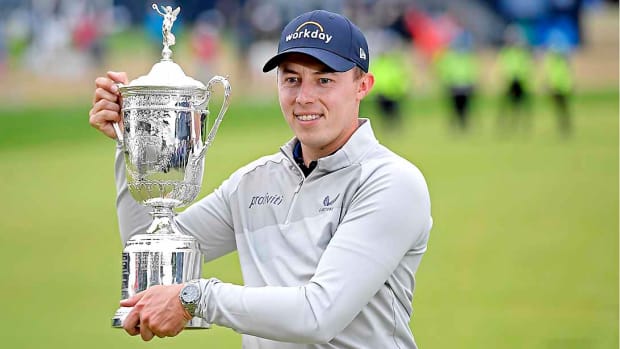 Matt Fitzpatrick holds the 2022 U.S. Open trophy after his victory on Sunday, June 19, 2022.