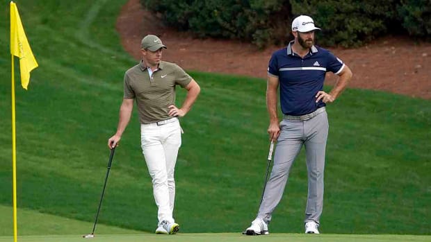 Rory McIlroy and Dustin Johnson are pictured at the 2020 Masters.