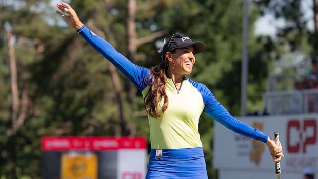 Paula Reto celebrates after winning the Canadian Pacific Women's Open.