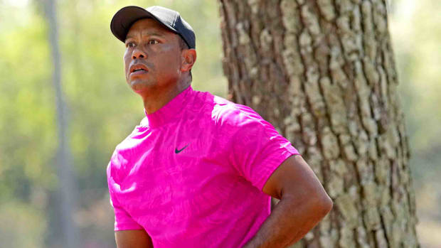 Tiger Woods watches a shot during the first round of the 2022 Masters.