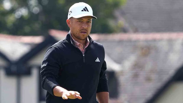 Xander Schauffele acknowledges the crowd during the first round of the 2023 British Open.