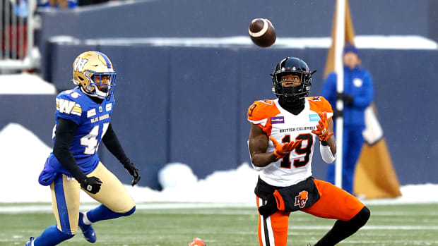 Nov 13, 2022; Winnigeg, Manitoba, CAN; Winnipeg Blue Bombers defensive back Jamal Parker (45) watches BC Lions wide receiver Dominique Rhymes (19) getting ready to catch the ball in the first half at Investors Group Field. Mandatory Credit: James Carey Lauder-USA TODAY Sports  