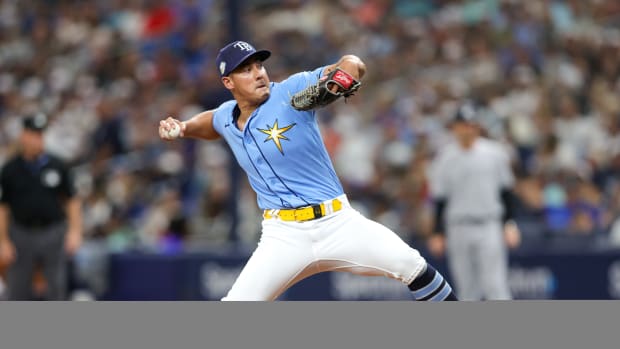 Aug 27, 2023; St. Petersburg, Florida, USA; Tampa Bay Rays relief pitcher Robert Stephenson (26) throws a pitch against the New York Yankees in the eighth inning at Tropicana Field.