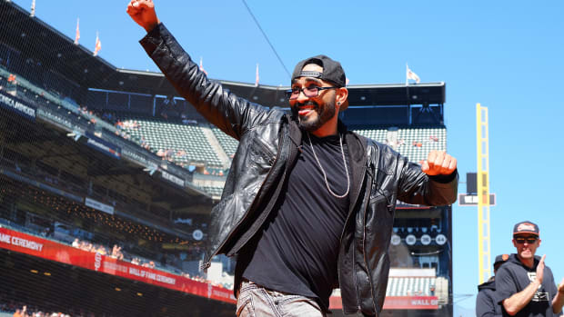 Former SF Giants player Sergio Romo is introduced during a Wall of Fame induction ceremony before the game against Atlanta at Oracle Park. (2023)