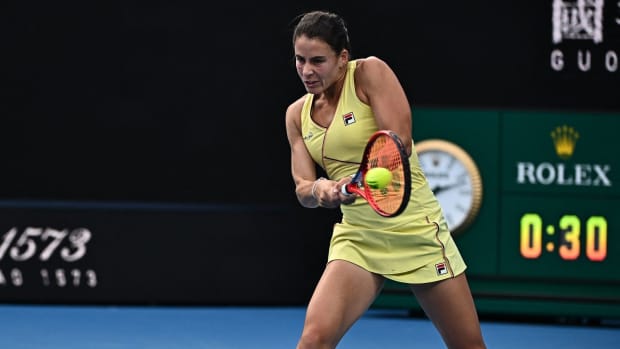 Emma Navarro returns a volley during a match against Italy's Elisabetta Cocciaretto in the second round of the 2024 Australian Open.