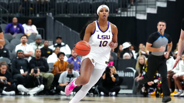 Nov 6, 2023; Las Vegas, Nevada, USA; LSU Lady Tigers forward Angel Reese (10) dribbles against the Colorado Buffaloes during the first quarter at T-Mobile Arena. 