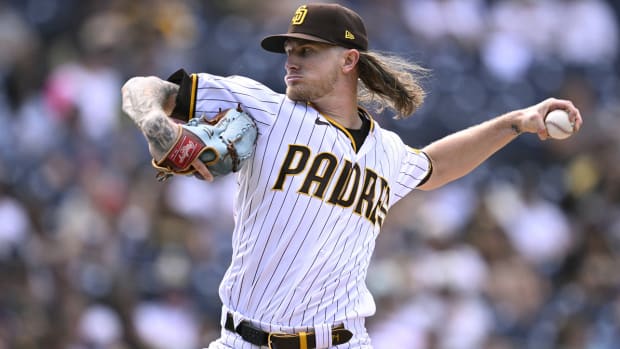 Padres relief pitcher Josh Hader throws a pitch in a game against the Rockies.