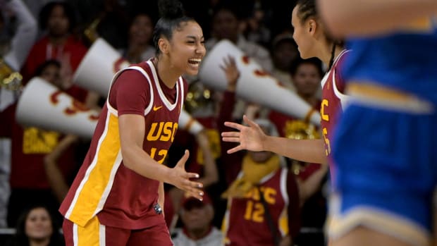 Jan 14, 2024; Los Angeles, California, USA; USC Trojans guard JuJu Watkins (12) celebrates in the fourth quarter after defeating the UCLA Bruins at Galen Center. 