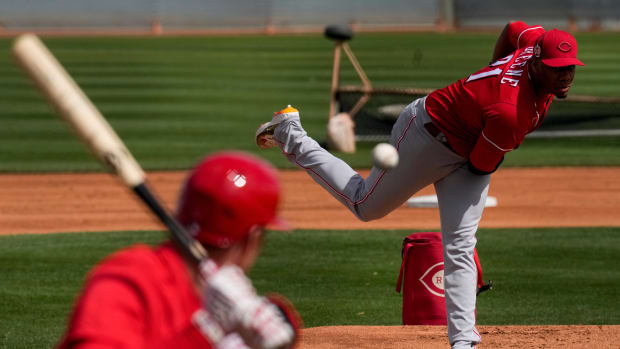 Cincinnati Reds starting pitcher Hunter Greene (21) delivers a pitch during a live batting practice session at the Cincinnati Reds Player Development Complex in Goodyear, Ariz., on Wednesday, Feb. 22, 2023. Cincinnati Reds Spring Training  