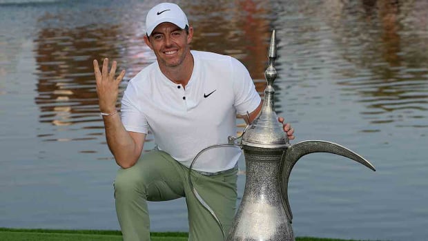 Rory McIlroy poses with the trophy after winning his fourth Hero Dubai Desert Classic on Jan. 21, 2024.