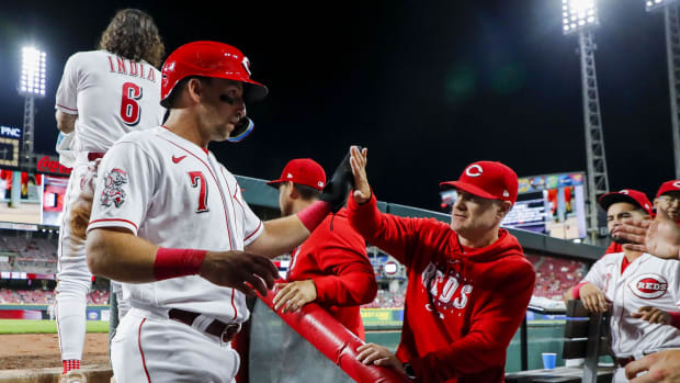 Sep 18, 2023; Cincinnati, Ohio, USA; Cincinnati Reds left fielder Spencer Steer (7) high fives manager David Bell (25) after scoring on a two-run single hit by first baseman Joey Votto (not pictured) in the seventh inning against the Minnesota Twins at Great American Ball Park. Mandatory Credit: Katie Stratman-USA TODAY SportsThe caravan starts this week