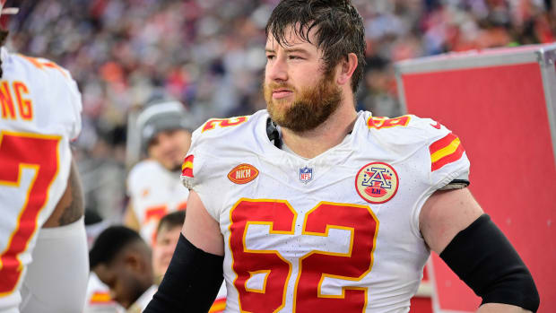Dec 17, 2023; Foxborough, Massachusetts, USA; Kansas City Chiefs guard Joe Thuney (62) stands in the bench area during the second half against the New England Patriots at Gillette Stadium. Mandatory Credit: Eric Canha-USA TODAY Sports  