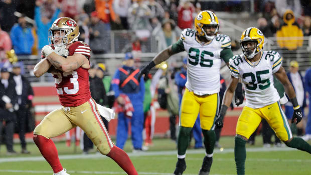 Jan 20, 2024; Santa Clara, CA, USA; San Francisco 49ers running back Christian McCaffrey (23) crosses the goal line for the decisive touchdown late in the fourth quarter against the Green Bay Packers in a 2024 NFC divisional round game at Levi's Stadium. Mandatory Credit: Dan Powers-USA TODAY Sports