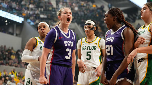 Jan 3, 2024; Waco, Texas, USA; TCU Horned Frogs guard Madison Conner (3) celebrates after a score against Baylor Lady Bears guard Yaya Felder (2) during the first half at Paul and Alejandra Foster Pavilion. Mandatory Credit: Chris Jones-USA TODAY Sports
