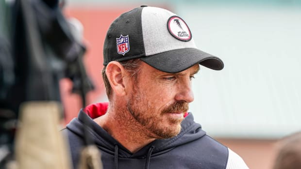Atlanta Falcons defensive coordinator Ryan Nielsen answers questions for the media during minicamp