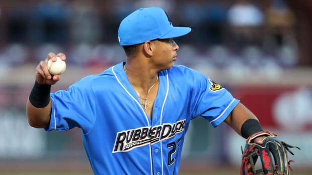 Aug 31, 2023; Akron, OH, USA; Akron RubberDucks infielder Juan Brito (22) throws to first base between innings during a game Aug. 31 against the Bowie Baysox at Canal Park in Akron.