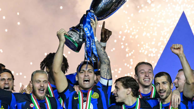 Lautaro Martinez pictured lifting the Supercoppa Italiana trophy after scoring for Inter Milan in a 1-0 win over Napoli in the final in January 2024