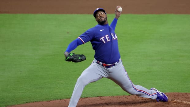 Oct 15, 2023; Houston, Texas, USA; Texas Rangers pitcher Aroldis Chapman (45) throws during the eighth inning of game one of the ALCS against the Houston Astros in the 2023 MLB playoffs at Minute Maid Park.